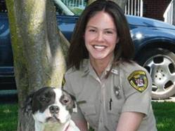 photo of animal control officer chan with dog